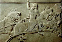 Ашшурбанипал охотится на льва (барельеф из Ниневии)